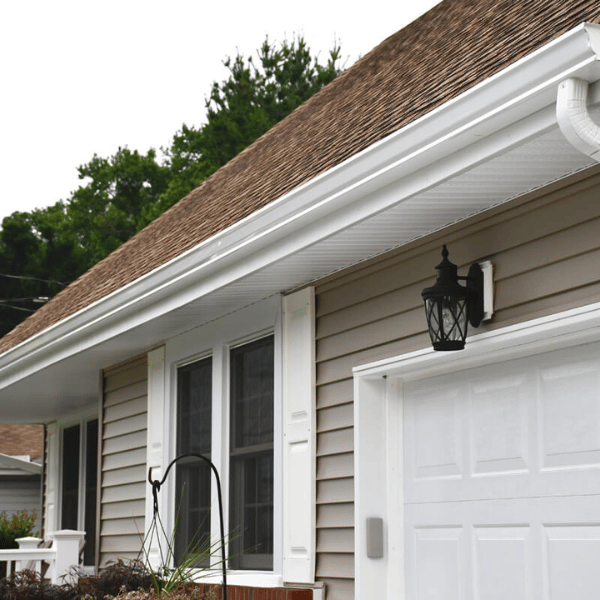 Seamless gutters installed on a modern home, designed to improve water flow and protect the property.